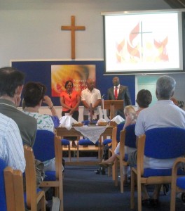 Stephanie, Alfred and their Old Pastor as they were welcomed into KBC membership.